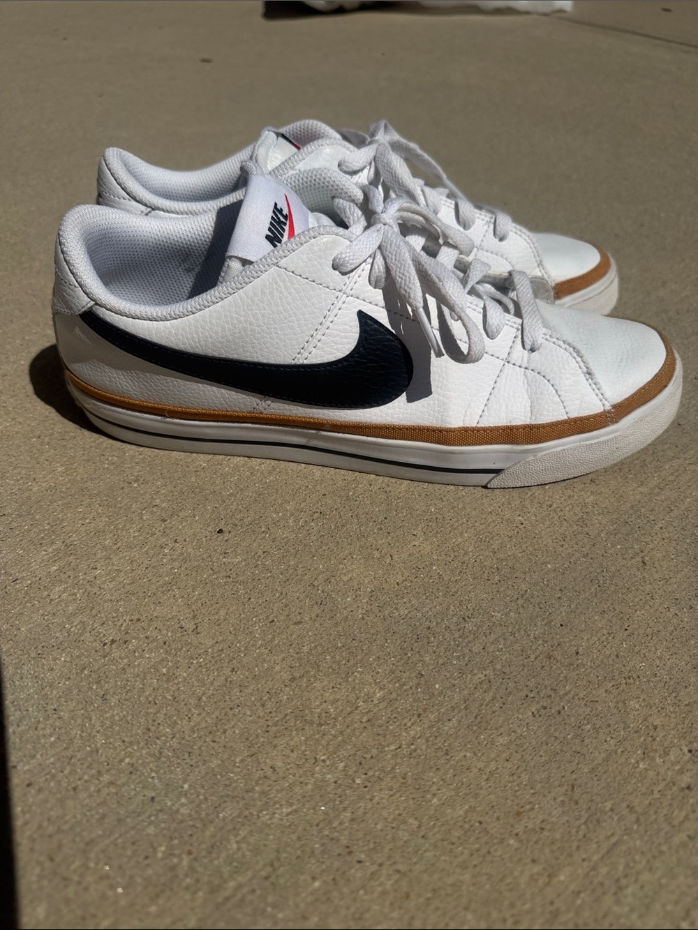 Nike Women’s White Court Legacy Leather Low-Top Sneakers with Black Swoosh